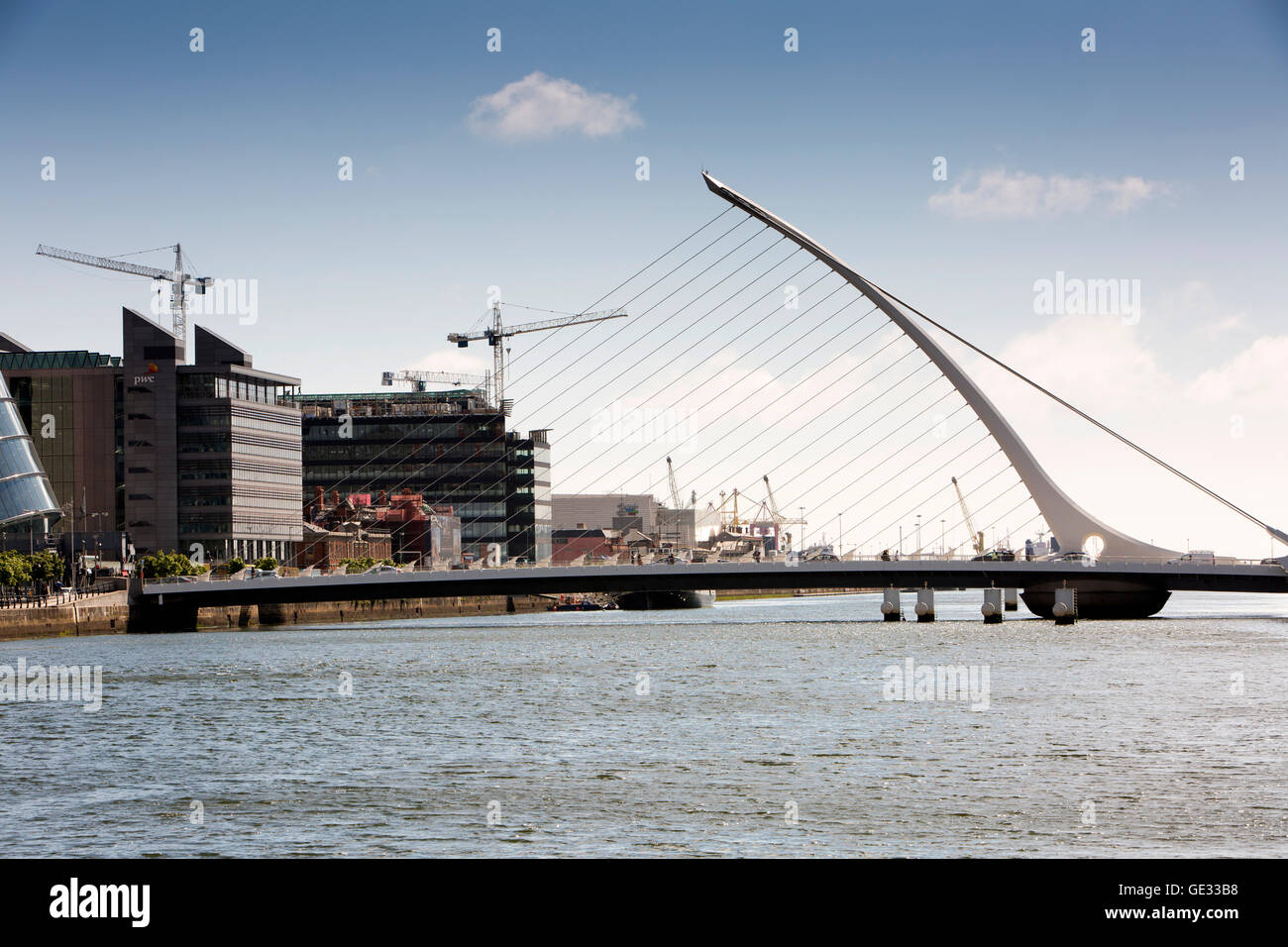 Ireland, Dublin, Samuel Beckett Bridge, 2007 cable stayed crossing over River Liffey in shape of a harp Stock Photo
