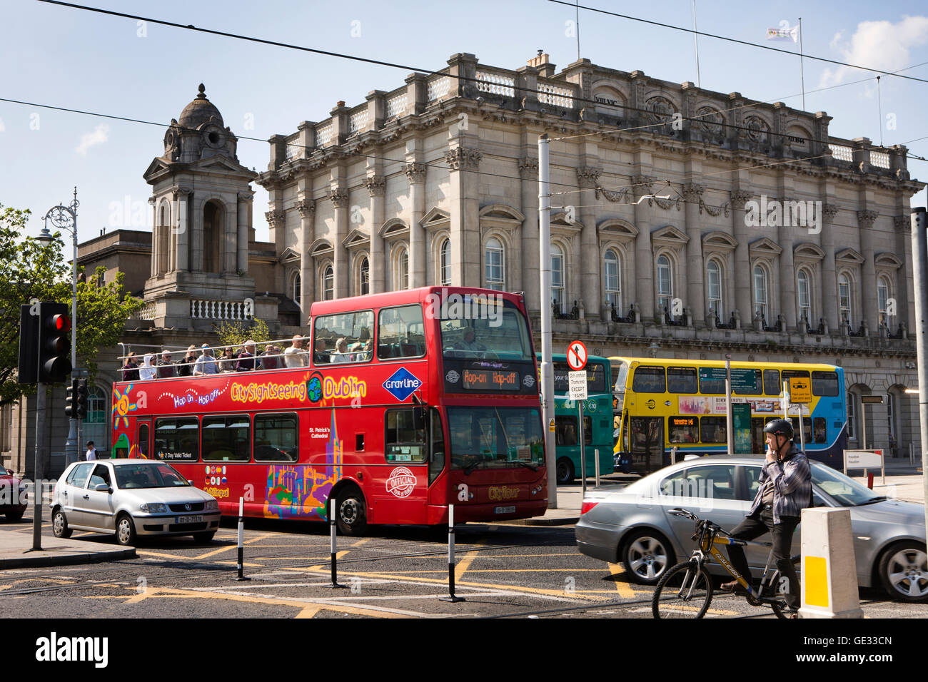 Ireland, Dublin, Steven Street, red city sightseeing tour bus passing Heuston Railway Station Stock Photo