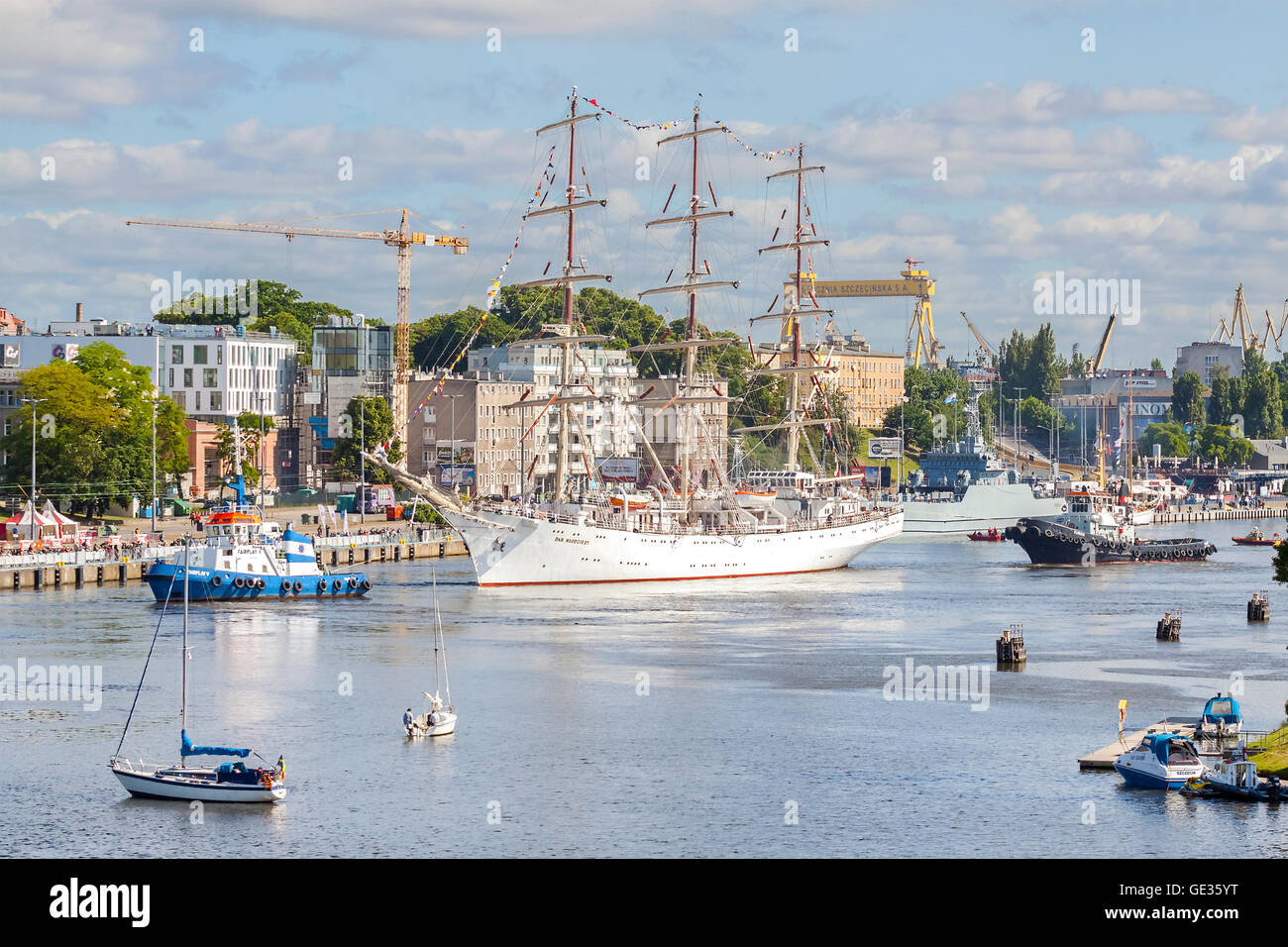 Dar Mlodziezy, one of the biggest ships is about to leave the harbor. Stock Photo