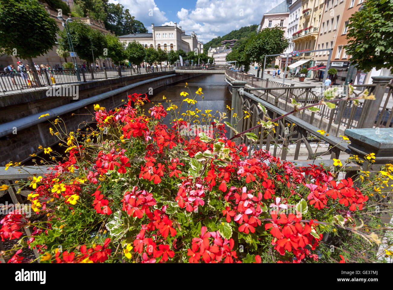 Karlovy Vary Tepla river canal bridge flowers Karlovy Vary Bohemia Czech Republic Stock Photo