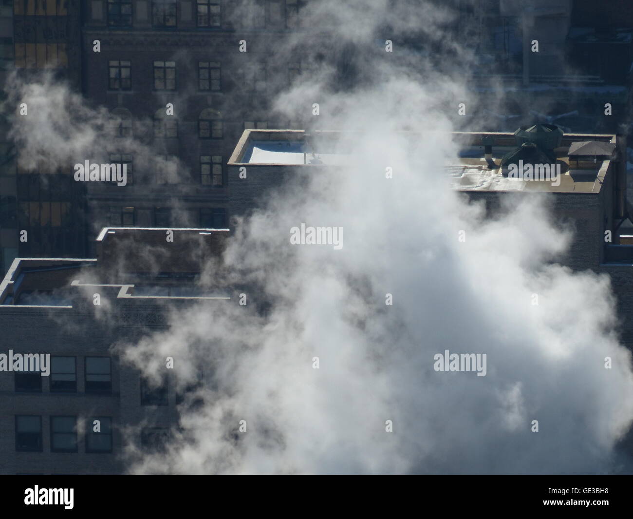 steam coming out of New York office tower Stock Photo