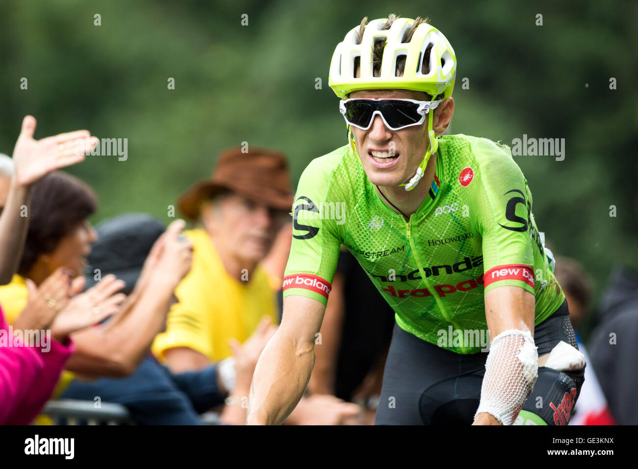 Tour de France. 22nd July, 2016. Saint-Gervais-les-Bains, FR. Pierre Rolland (Cannondale-Drapac Pro Cycling) approaches the final 500m of the finishing climb to Saint-Gervais. Rolland crashed earlier in the stage, leaving cuts and bruises on his left side and tearing his cycling kit. John Kavouris/Alamy Live News Stock Photo