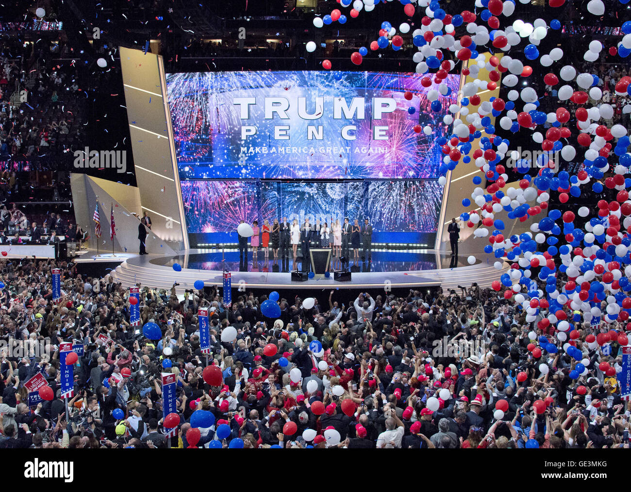 Cleveland, Ohio, USA. 21st July, 2016. Trump and Pence families on the podium as the balloons drop following his acceptance speech as the GOP candidate for President of the United States at the 2016 Republican National Convention held at the Quicken Loans Arena in Cleveland, Ohio on Thursday, July 21, 2016.Credit: Ron Sachs/CNP. © Ron Sachs/CNP/ZUMA Wire/Alamy Live News Stock Photo