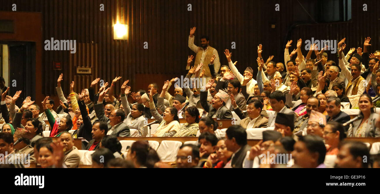 Kathmandu, Nepal. 22nd July, 2016. Majority of parliamentarians of opposition parties raise hands rejecting the budget-related bills during the discussion of the no-confidence motion filed against Prime Minister in the parliament in Kathmandu, Nepal, July 22, 2016. Nepal government led by KP Sharma Oli has fallen under minority on Friday after the no-confidence motion was registered in the Parliament against him. © Sunil Sharma/Xinhua/Alamy Live News Stock Photo