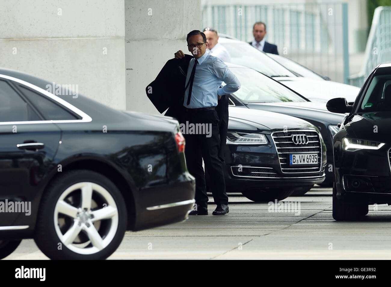 Berlin, Germany. 23rd July, 2016. Justice minister Heiko Maas (SPD) arrives for emergency talks on the security situation at the federal chancellery in Berlin, Germany, 23 July 2016. After an attack in Munich interior minister de Maizière (CDU) has ordered flags at half-mast throughout Germany. An 18-year-old German-Iranian had killed nine people and himself in Munich on Friday evening. The background and motive of the attack remain unclear. PHOTO: Maurizio Gambarini/dpa/Alamy Live News Stock Photo