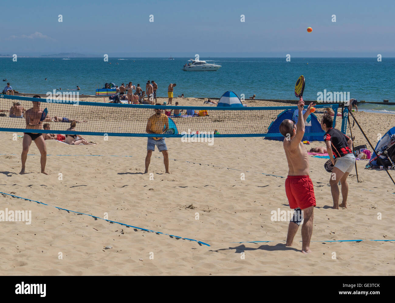 People playing beach tennis at Bournemouth, UK Stock Photo