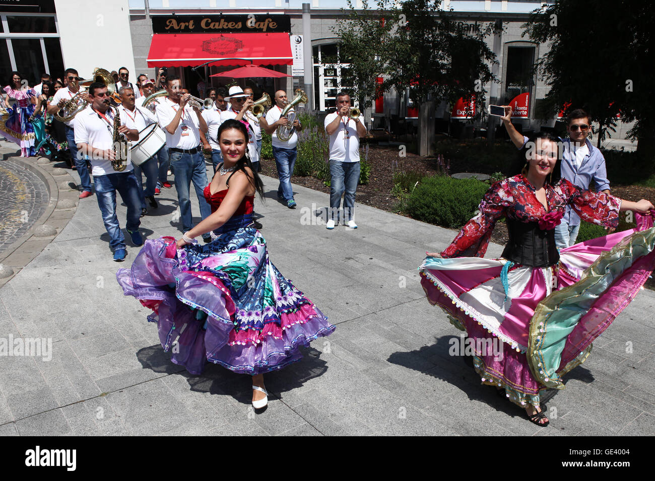 Bratislava, Slovakia. 23rd July, 2016. Gypsy artists in traditional  costumes perform at the street during the 9th 