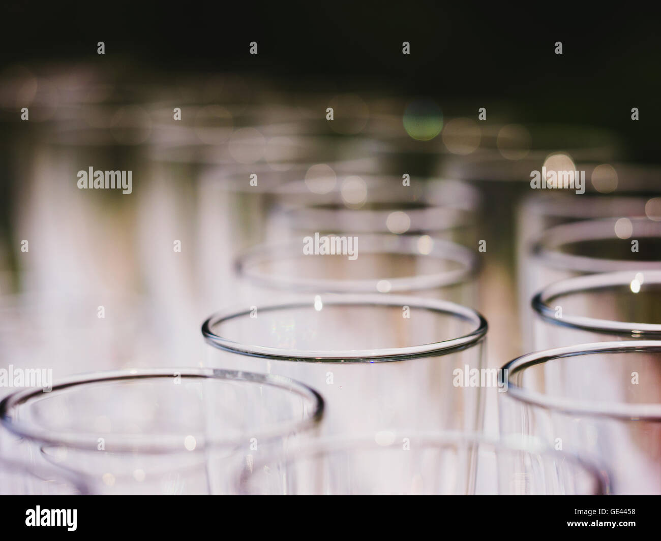 Empty glasses on a banquet table close up Stock Photo - Alamy