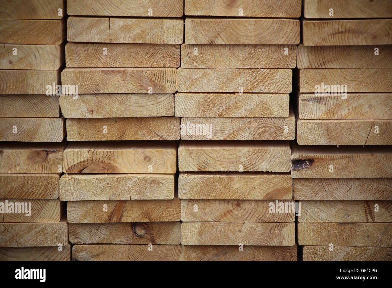 Lumbers. Organized stack of new lumbers, construction Lumbers, wood planks, raw planks Construction material. Close up. Stock Photo