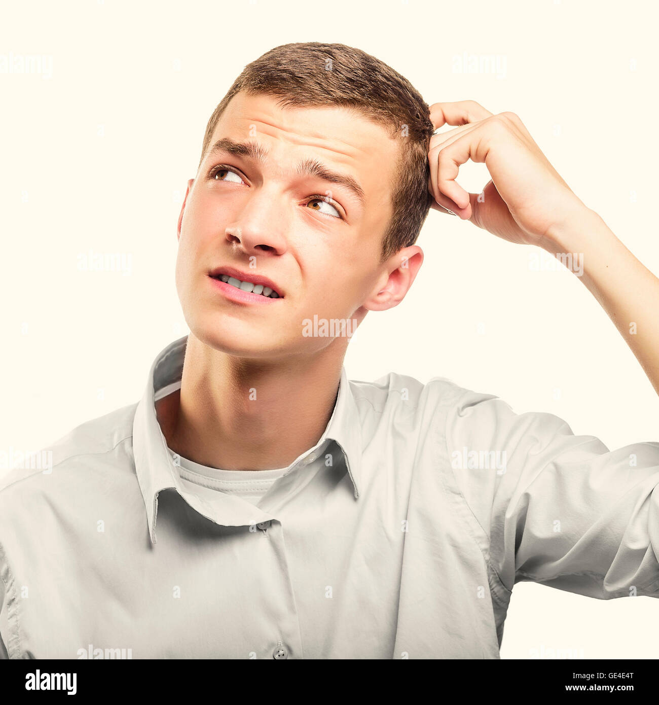 Handsome young thoughtful man hi-res stock photography and images - Alamy