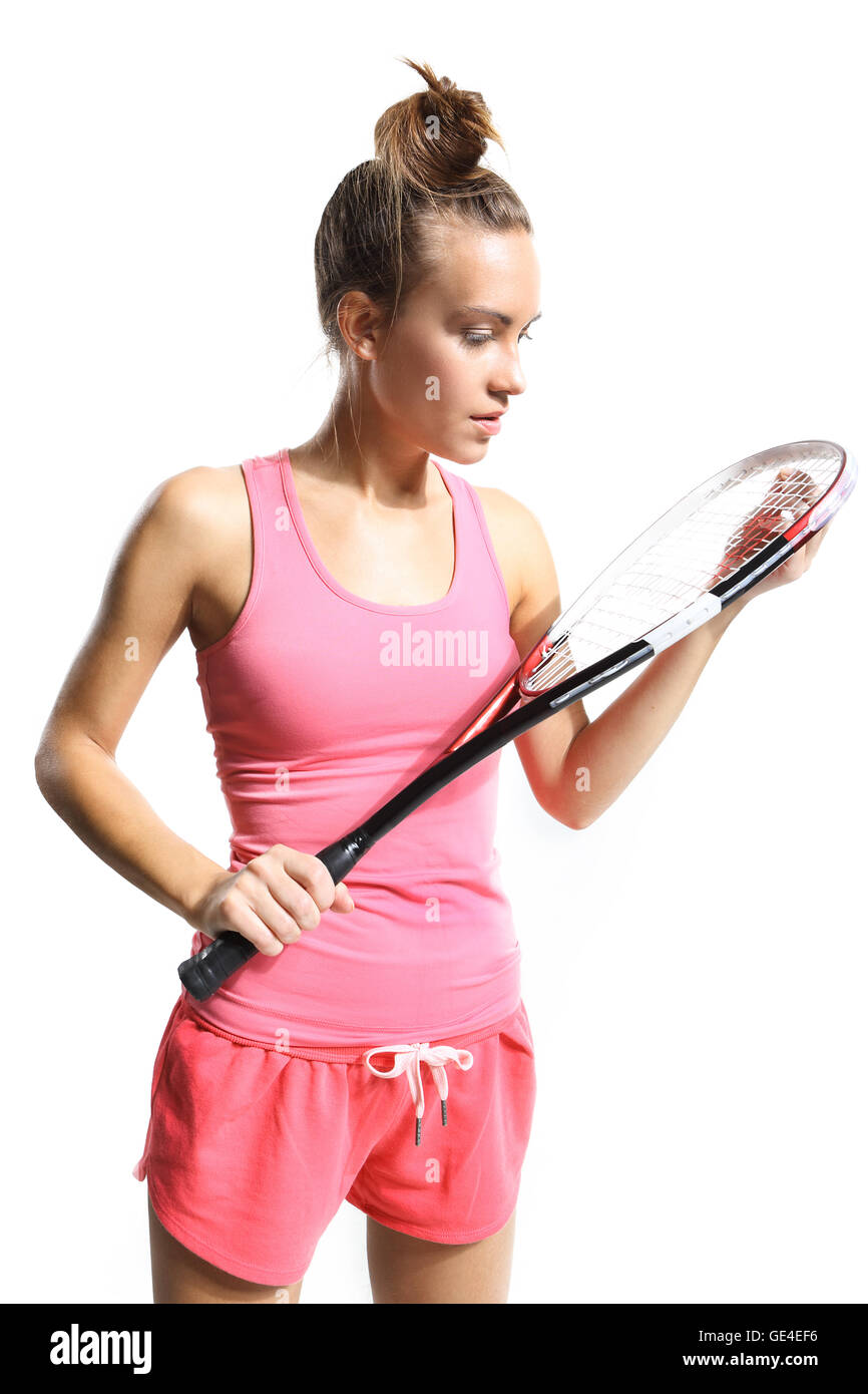 Beautiful athletic woman with squash racket Stock Photo