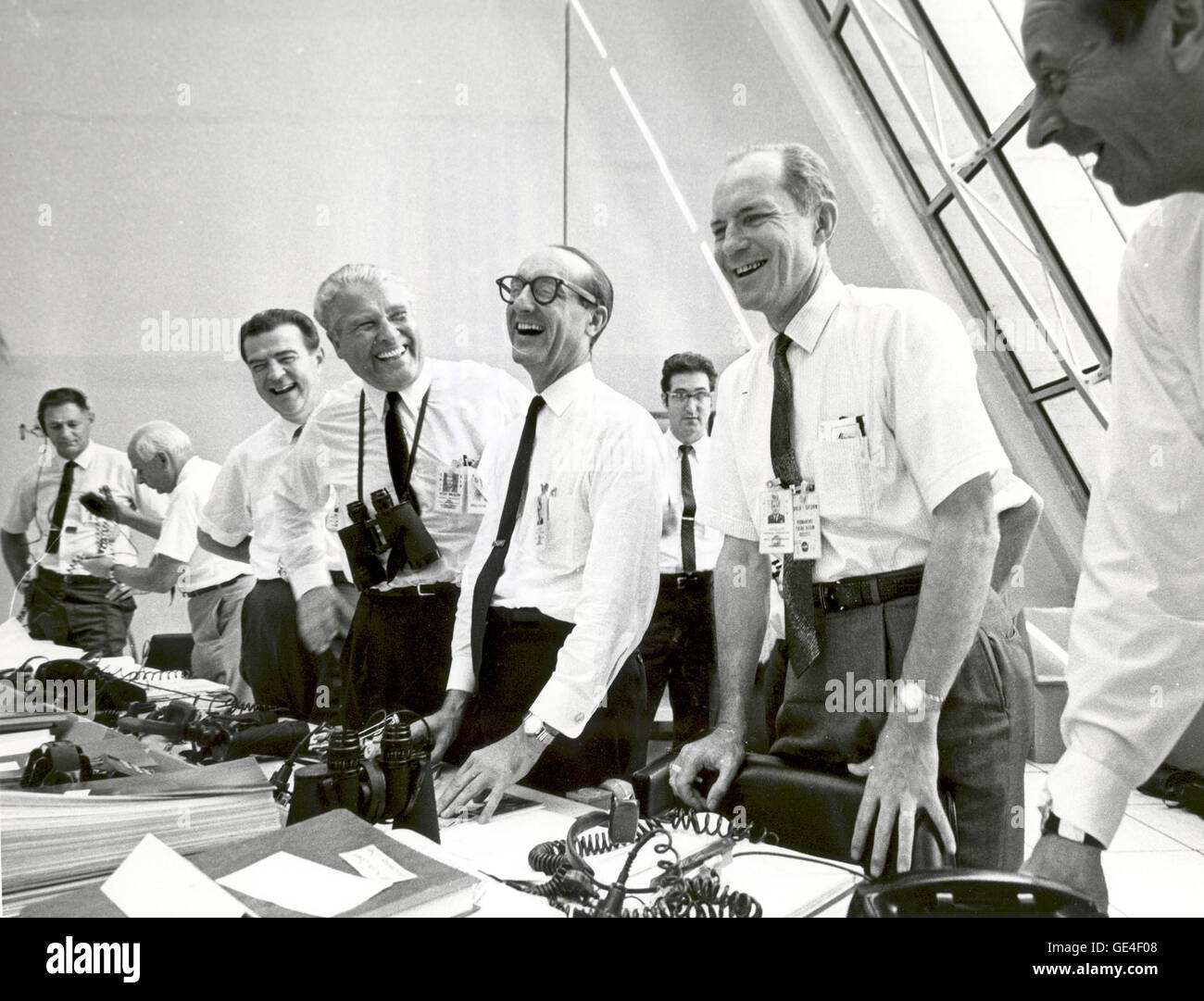 (July 16, 1969) Apollo 11 mission officials relax in the Launch Control Center following the successful Apollo 11 liftoff on July 16, 1969. From left to right are: Charles W. Mathews, Deputy Associate Administrator for Manned Space Flight; Dr. Wernher von Braun, Director of the Marshall Space Flight Center; George Mueller, Associate Administrator for the Office of Manned Space Flight; Lt. Gen. Samuel C. Phillips, Director of the Apollo Program   Image # : 108-KSC-69P-641 Stock Photo