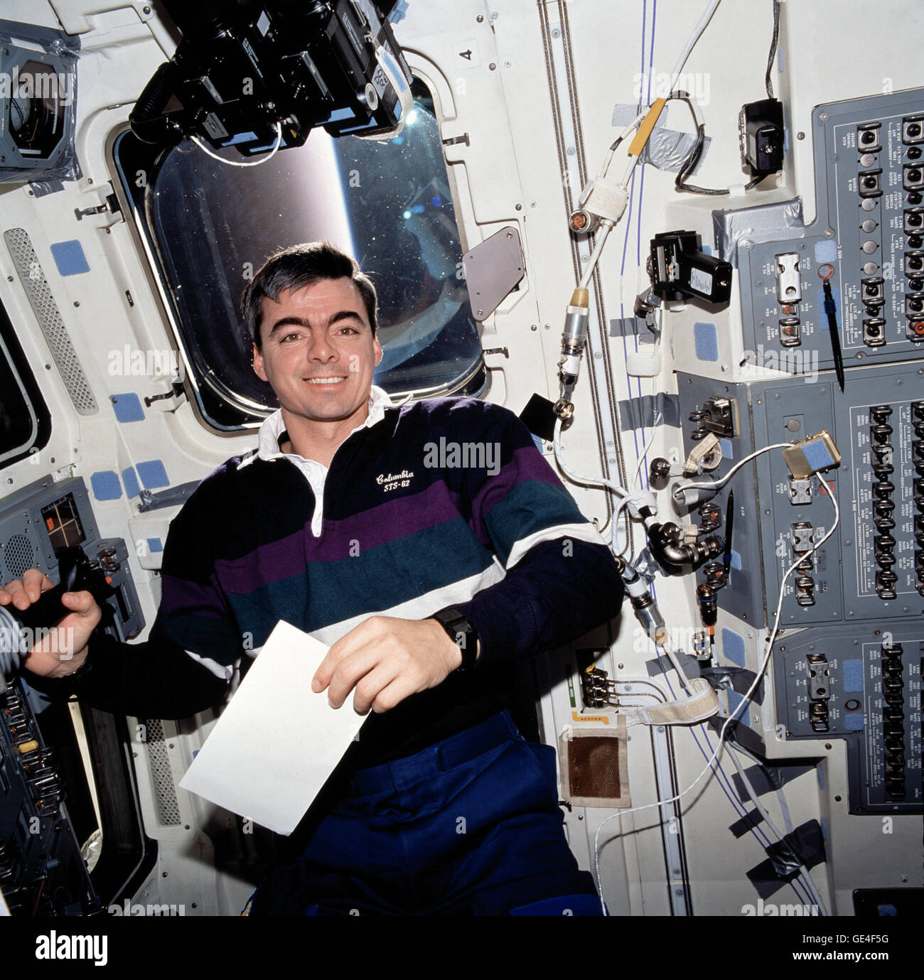 Pilot Andrew Allen posed for this picture on the Space Shuttle Columbia's flight deck during STS-62. Allen flew on three Space Shuttle missions: STS-46, STS-62, and STS-75.  Image #: sts062-113-099 Date: March 13, 1994 Stock Photo