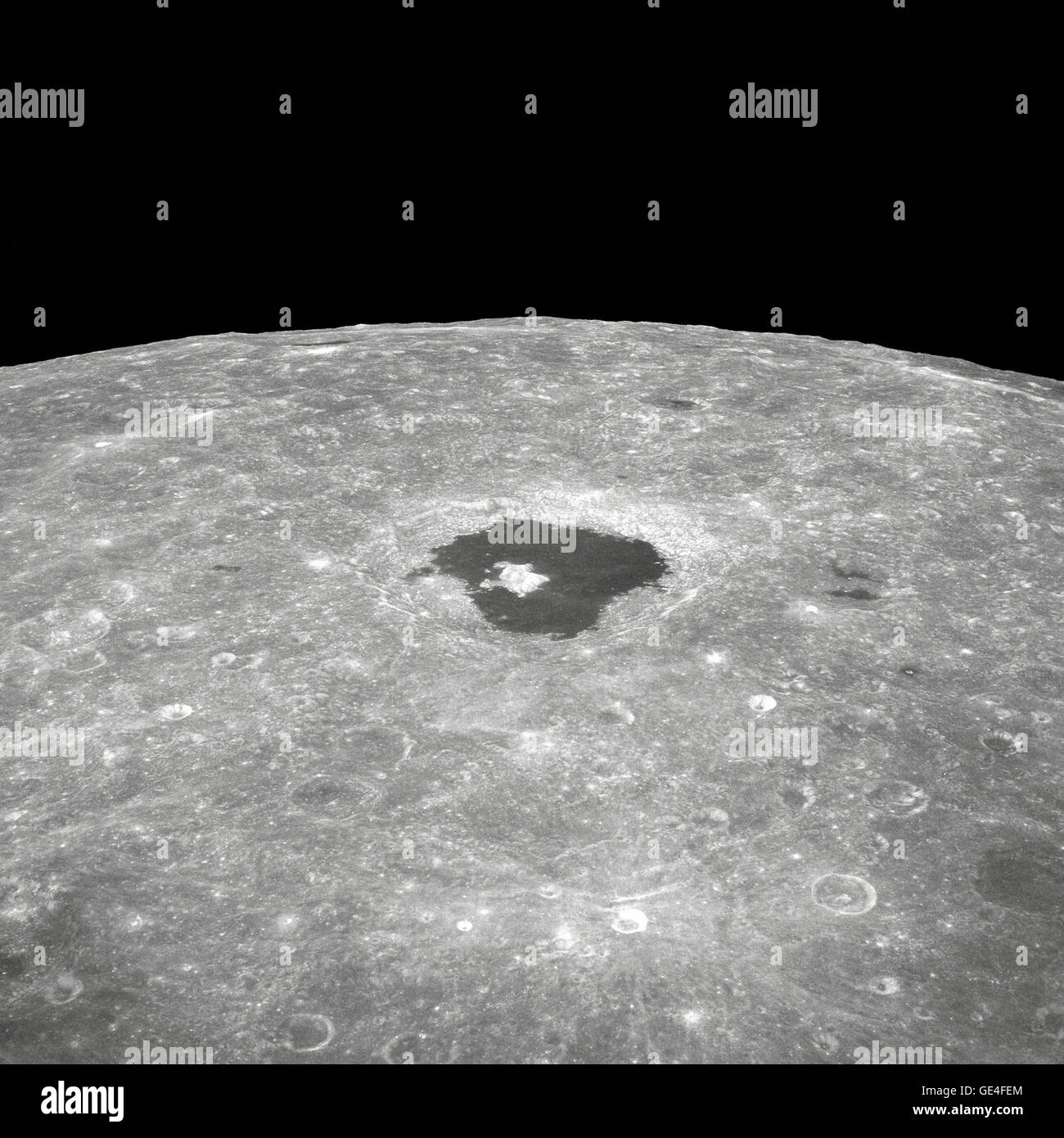 (December 24, 1968) This is a view of the large crater Tsiolkovsky as photographed by the astronauts during the Apollo 8 lunar orbit mission, looking East toward the lunar horizon. Tsiolkovsky is approximately 150 statute miles in diameter. It was first identified and named by the Russians from photographs taken by their unmanned Luna III spacecraft  Image # : AS8-12-2196 Stock Photo