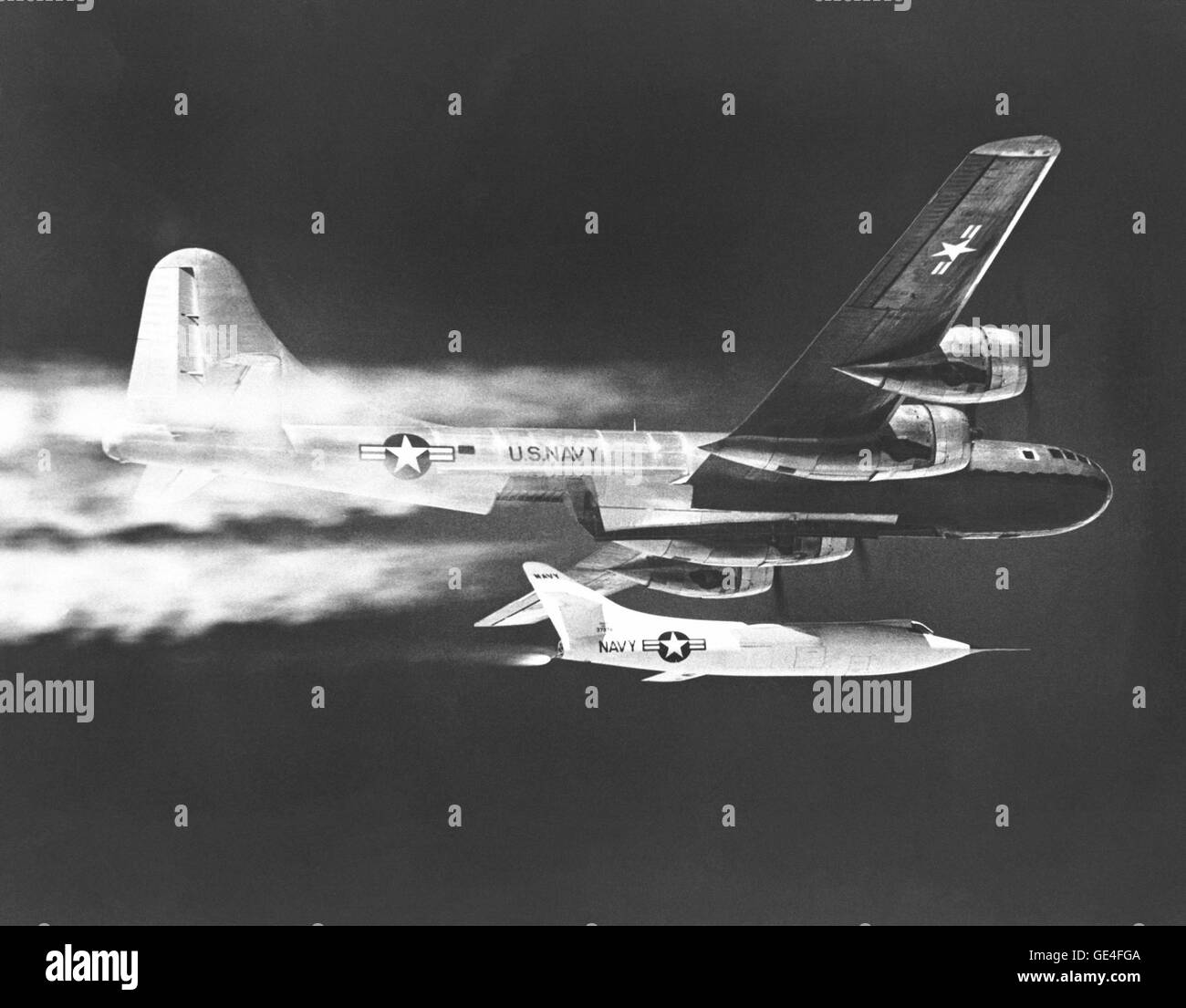 Description: (November 30, 1956) The D-558-2 #2 is launched from the P2B-1 in this 1956 NACA High-Speed Flight Station photograph. The D-558 Phase Two aircraft was quite different from its Phase One predecessor, the Skystreak. German wartime aeronautical research records, reviewed in 1945 by Douglas Aircraft Company personnel, pointed to many advantages gained from incorporating sweptback wing design into future research aircraft. These findings along with wind tunnel studies performed by the National Advisory Committee for Aeronautics (NACA) at Langley Memorial Aeronautical Laboratory, result Stock Photo
