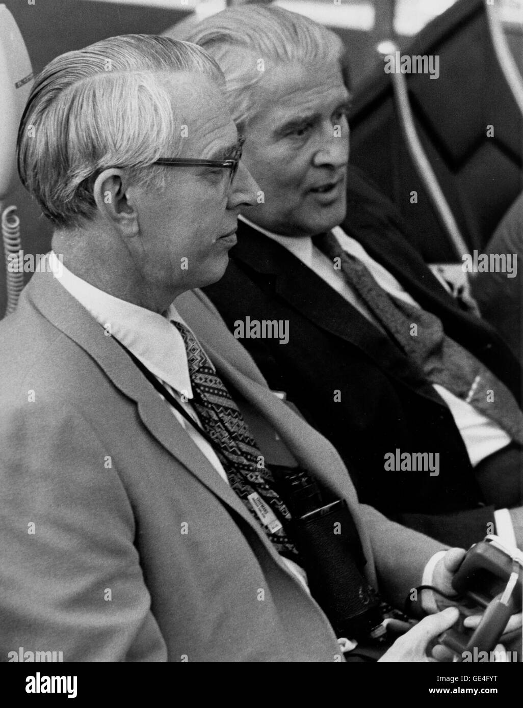 Recently appointed NASA Administrator Dr. James C. Fletcher, left, and Dr. Wernher von Braun, Deputy Associate Administrator for Planning, monitor Apollo 15 prelaunch activities in Firing Room 1 of the Launch Control Center and the Kennedy Space Center, Florida.  Image # : 71-H-1204 Stock Photo