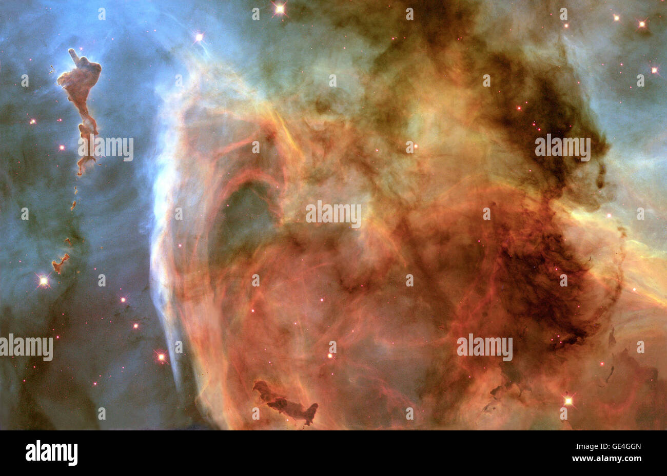 (February 3, 2000) Previously unseen details of a mysterious, complex structure within the Carina Nebula (NGC 3372) are revealed by this image of the &quot;Keyhole Nebula,&quot; obtained with NASA's Hubble Space Telescope. The picture is a montage assembled from four different April 1999 telescope pointings with Hubble's Wide Field Planetary Camera 2, which used six different color filters. The picture is dominated by a large, approximately circular feature, which is part of the Keyhole Nebula, named in the 19th century by Sir John Herschel. This region, about 8000 light-years from Earth, is l Stock Photo
