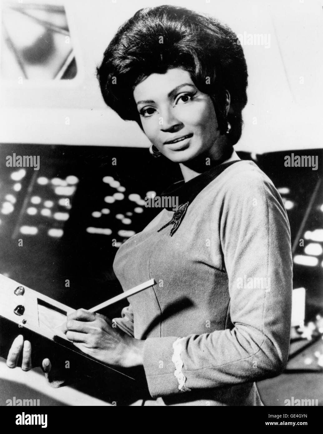 (March 24, 1977) Actress Nichelle Nichols was born in Robbins, Illinois on December 29, 1936. She played Lieutenant Uhura the Communications Officer on the U.S.S. Enterprise in the original series, Star Trek. Nichols stayed with the show and has appeared in six Star Trek movies. Her portrayal of Uhura on Star Trek marked one of the first non-stereotypical roles assigned to an African-American actress. She also provided the voice for Lt. Uhura on the Star Trek animated series in 1974-75. Before joining the crew on Star Trek, she sang and danced with Duke Ellington's band. Nichols was always int Stock Photo