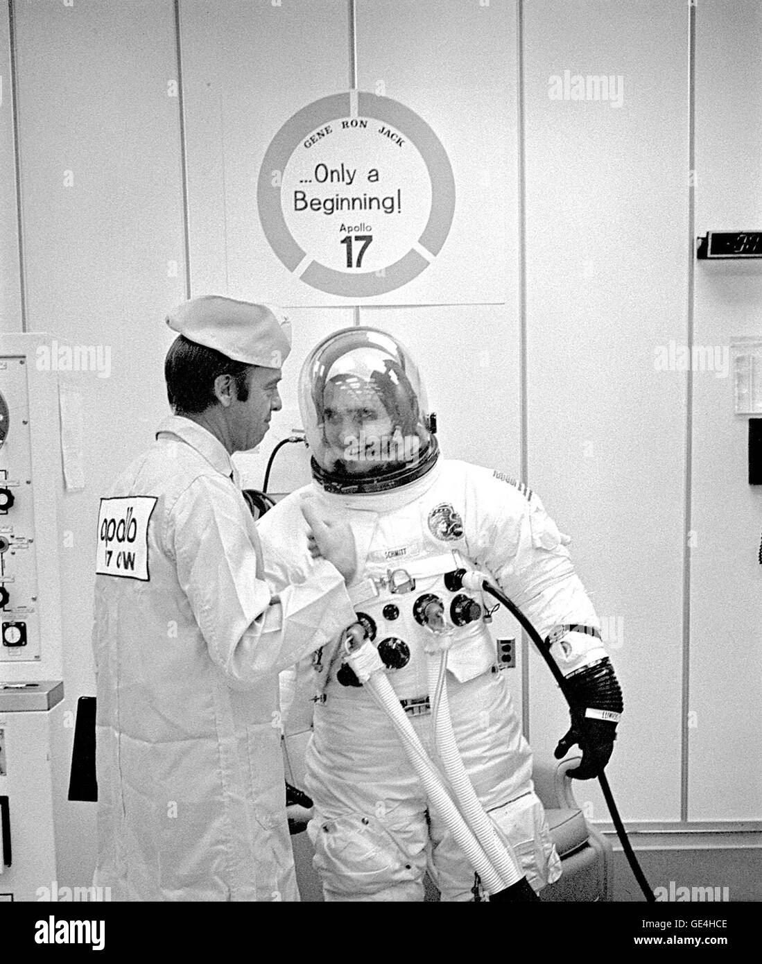 (December 6, 1972) Apollo 17 Lunar Module Pilot Harrison H. Schmitt shares a moment of relaxation with astronaut Alan Shepard during prelaunch suiting operations. Schmitt will explore the Moon's Taurus-Littrow region with Mission Commander Eugene A. Cernan during NASA's sixth and last manned lunar landing mission. The third crewman, Ronald E. Evans, will pilot the command module alone in lunar orbit during his crewmates' surface exploration.  Image # : 72P-0547 Stock Photo