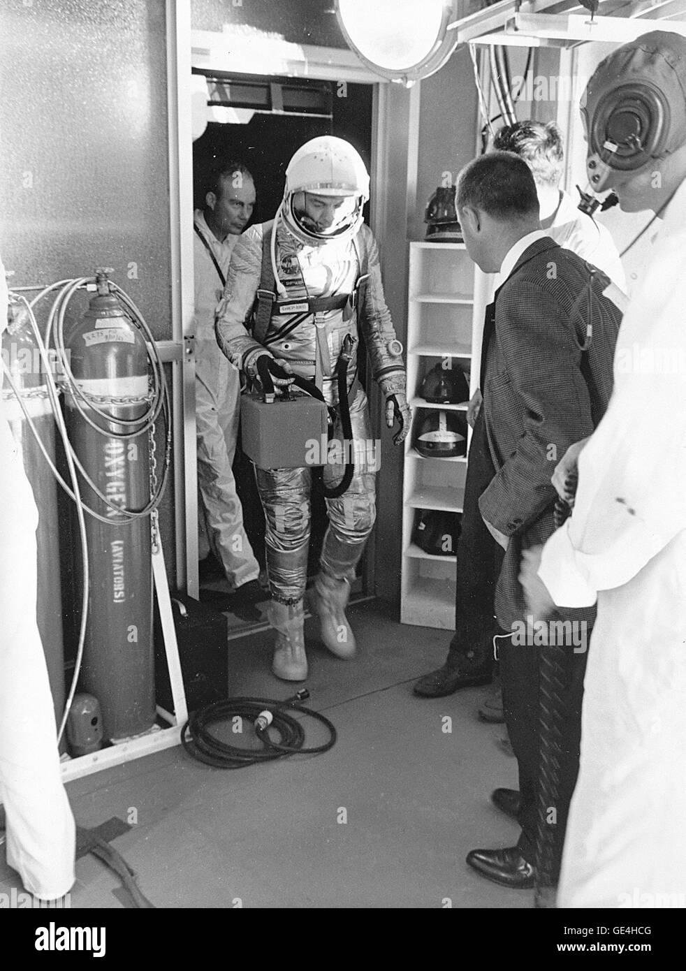 Astronaut Alan B. Shepard, Jr., makes his way from the elevator to the cleanroom atop the service tower where he'll be inserted into his Mercury space capsule nicknamed &quot;Freedom 7.&quot;  Image # : 71P-0270  Date: May 5, 1961 Stock Photo