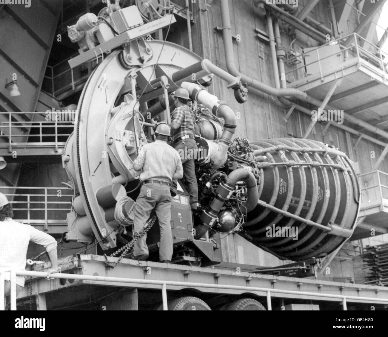 (1979) A Space Shuttle Main Engine (SSME) is hoisted into the A-2 Test Stand at the John C. Stennis Space Center before undergoing a test firing. Stock Photo