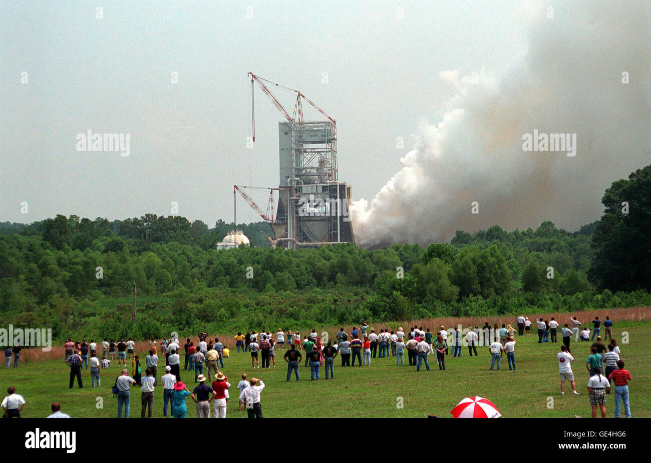 On the 25th Anniversary of the Apollo 11 (the first moon landing mission) launch, Marshall Space &amp; Flight Center celebrated with a test firing of the Space Shuttle Main Engine (SSME) at the Technology Test Bed (TTB). This drew a large crowd who stood in the fields around the test site and watched as plumes of white smoke verified ignition. Stock Photo