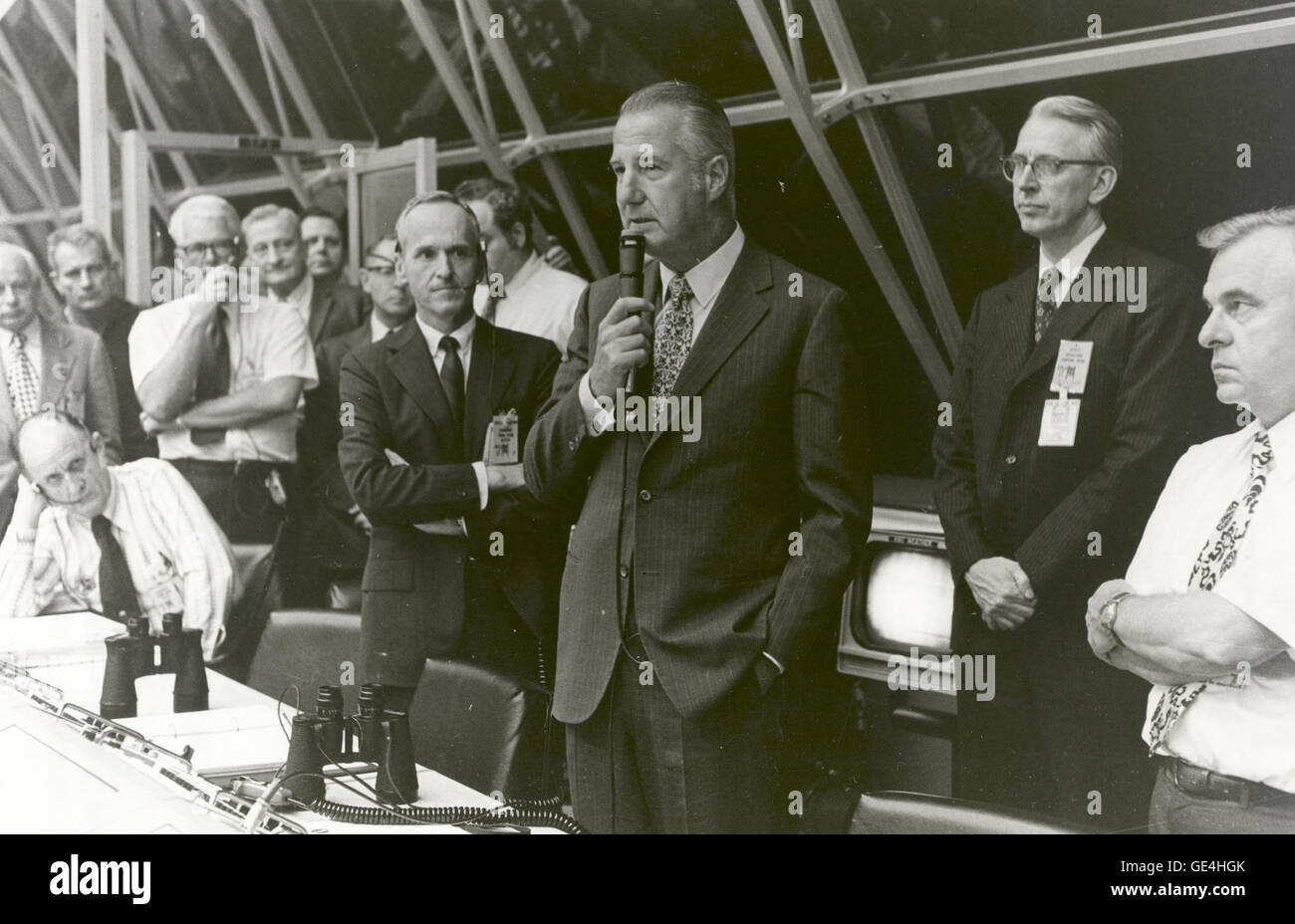 Vice President Spiro T. Agnew congratulates launch team personnel, in firing room #1 of launch control minutes after the successful launch of Apollo 17 from Complex 39-A at 12:33 am EST, December 7, 1972, with astronauts Eugene A. Cernan, Ronald E. Evans, and Harrison H. Schmitt aboard. Apollo 17, NASA's sixth and final manned lunar landing mission in the Apollo program, landed within 200 feet of the targeted point in the Taurus-Littrow landing site on the lunar surface at 2:55 pm EST on December 11, 1972.   Image # : 72-H-1538 Stock Photo