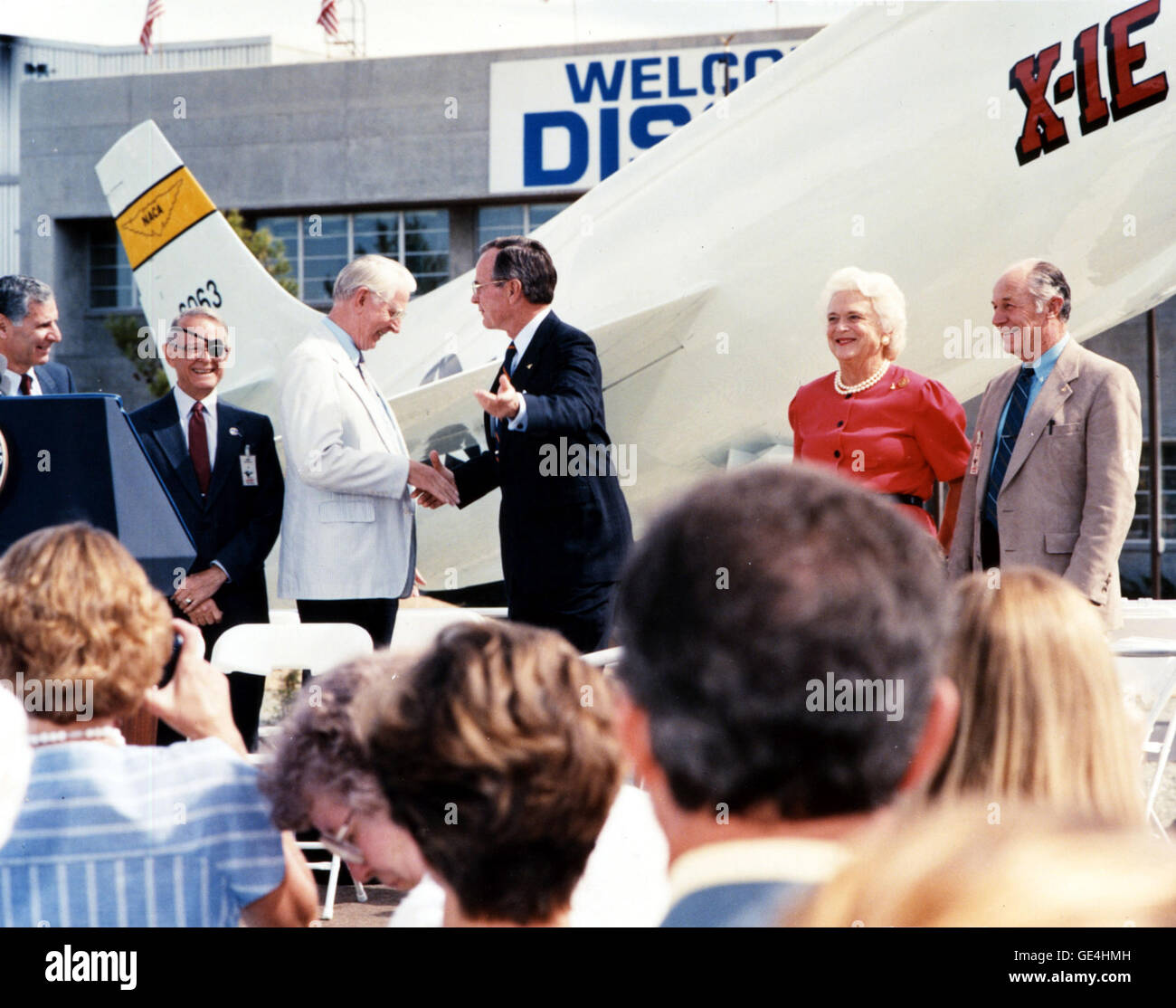 After a two-year hiatus, the STS-26 mission was NASA's return to spaceflight after the Challenger accident. Waiting to greet the STS-26 Discovery astronauts in front of the Dryden Headquarters building are, from left to right: California Governor George Deukmejian; NASA Deputy Administrator Dale Myers; NASA Administrator Dr. James C. Fletcher; Vice President George Bush; Barbara Bush; Brig. Gen (Ret) Charles Yeager.   Image # : 88-HC-516 Stock Photo