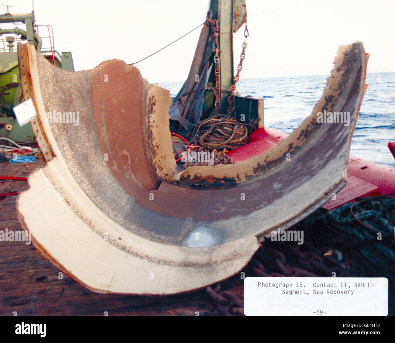 (March 7, 1986) On January 28, 1986, the Space Shuttle Challenger and her seven-member crew were lost when a ruptured O-ring in the right Solid Rocket Booster caused an explosion soon after launch. Search and recovery teams lifted this fragment of the Shuttle's Solid Rocket Booster (SRB) from the ocean onto a waiting ship and then returned it to Kennedy Space Center for the investigation into causes of the accident. A chemical profile on the propellant traces remaining on the metal combined with its ocean location in comparison to radar trajectory charts led the teams to conclude that this pie Stock Photo