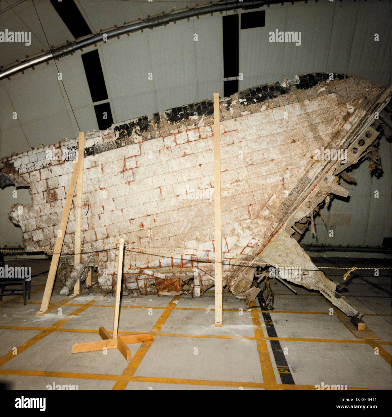 (April 15, 1986) On January 28, 1986, the Space Shuttle Challenger and her seven-member crew were lost when a ruptured O-ring in the right Solid Rocket Booster caused an explosion soon after launch. Among other debris found in the ocean, search and recovery teams located this piece of the right vertical stabilizer. Although the stabilizer's surface suffered some heat discoloration and burns, the inner aluminum structure showed no signs of having melted. Investigators found various pieces of material from other parts of the Shuttle embedded into the surface of the thermal protection tiles, as w Stock Photo