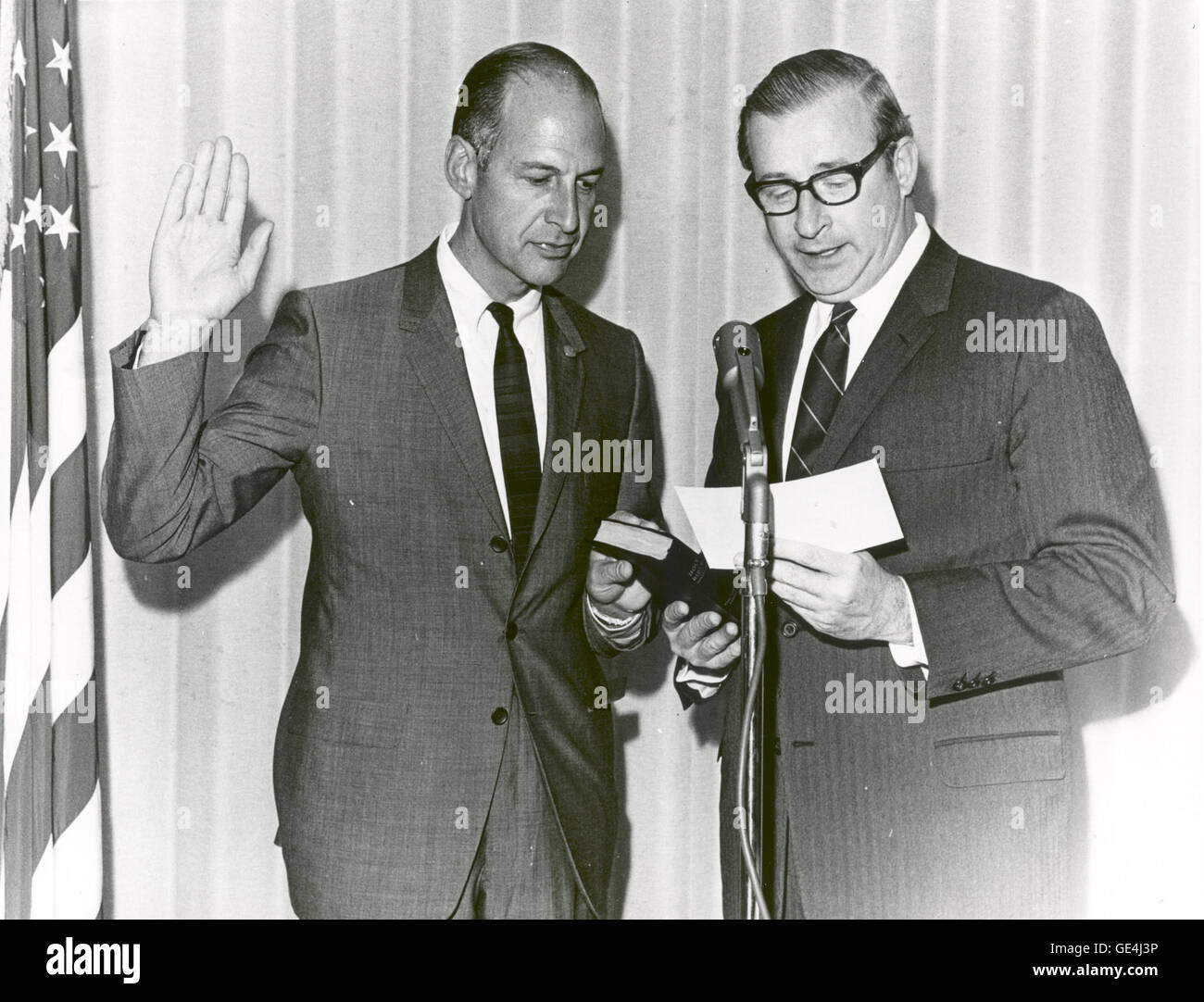 Swearing in of George M. Low as Deputy Administrator of NASA. The 43-year-old veteran of NASAs Mercury, Gemini, and Apollo manned flight programs was administered the oath of Office by Dr. Thomas O. Paine, NASA's Administrator. President Nixon nominated Low for the post November 13, 1969, and the Senate confirmed him on November 26, 1969. Low, who joined the National Advisory Committee for Aeronautics (NASAs predecessor agency) in 1949, was the fourth person to hold the Deputy Administrator post at NASA.  Image # : 69-H-2010 Stock Photo