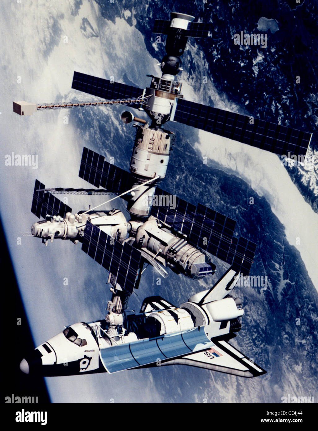 Shown is a technical rendition of the Space Shuttle Atlantis docked to the Kristall module of the Russian Mir Space Station. The configuration shown is that of STS-71/Mir Expedition 18, a joint U.S. Russian mission completed in June 1995. The Space Shuttle/Mir combination, which was the largest space platform ever assembled, is shown overflying the Lake Baikal region of Russia. The Space Shuttle Atlantis appears in a new configuration for the STS-71 flight. The Russian developed Androgynous Peripheral Docking System (APDS) is used to link the Orbiter to the Kristall module. The APDS is mounted Stock Photo