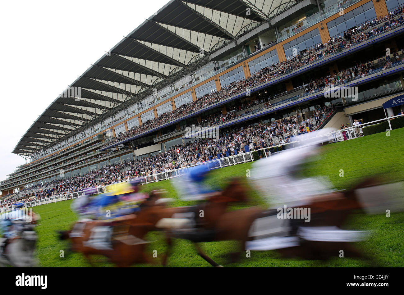 Runners pass the stands for the first time during The John Guest Brown Jack Stakes Race run on day one of the King George VI Weekend at Ascot Racecourse. PRESS ASSCOCIATION Photo. Picture date: Friday July 22, 2016. See PA story Racing Ascot. Photo credit should read: Julian Herbert/PA Wire. RESTRICTIONS: Use subject to restrictions. Editorial use only, no commercial or promotional use. No private sales. Call +44 (0)1158 447447 for further information. Stock Photo