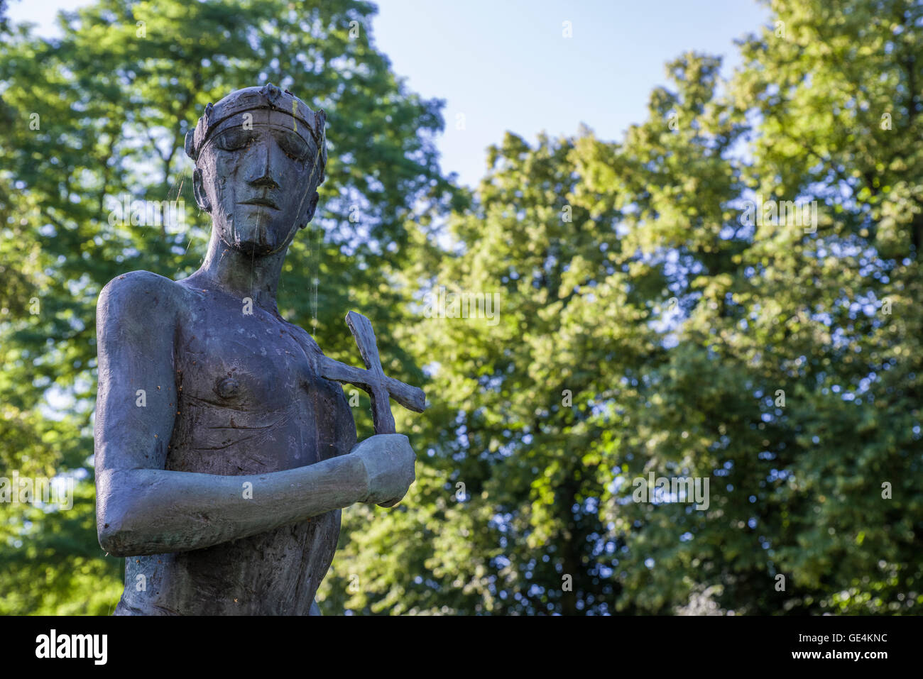 A sculpture of Saint Edmund located in churchyard of St. Edmundsbury Cathedral in Bury St. Edmunds, Suffolk. Stock Photo