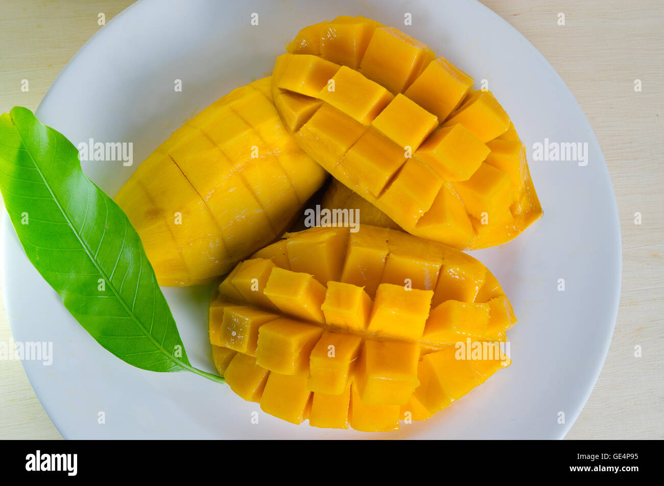 Mango with leaf hires stock photography and images Alamy