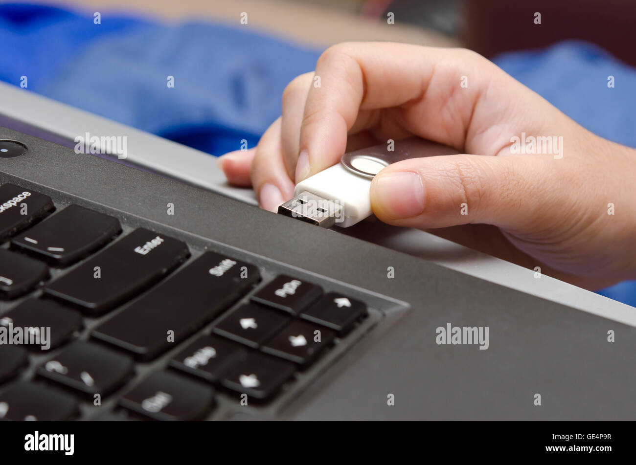 IT virus enter laptop computer via USB thumb drive Stock Photo - Alamy