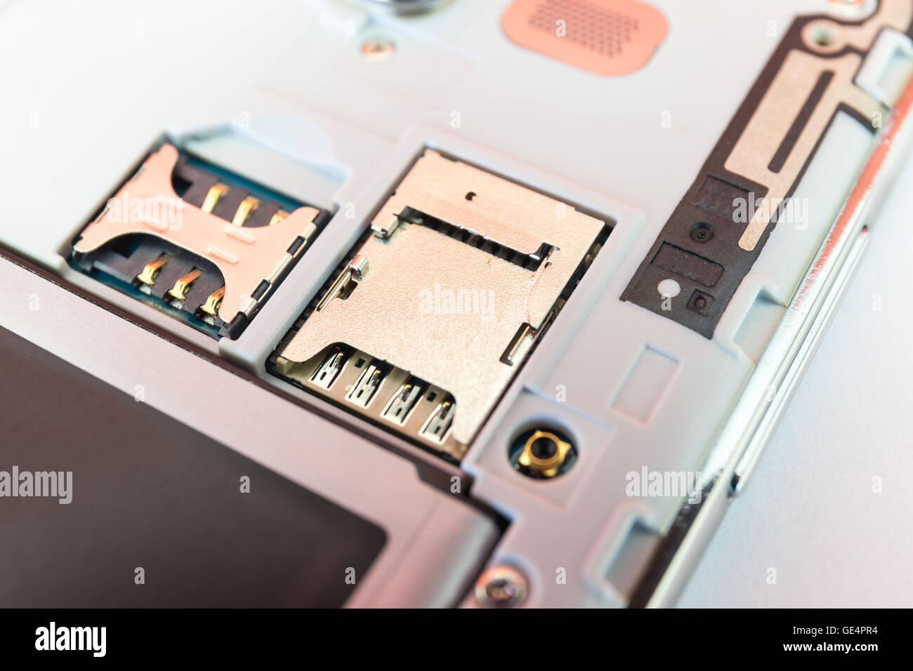 Closeup slot SIM card and slot memory micro SD card for smartphone Stock Photo