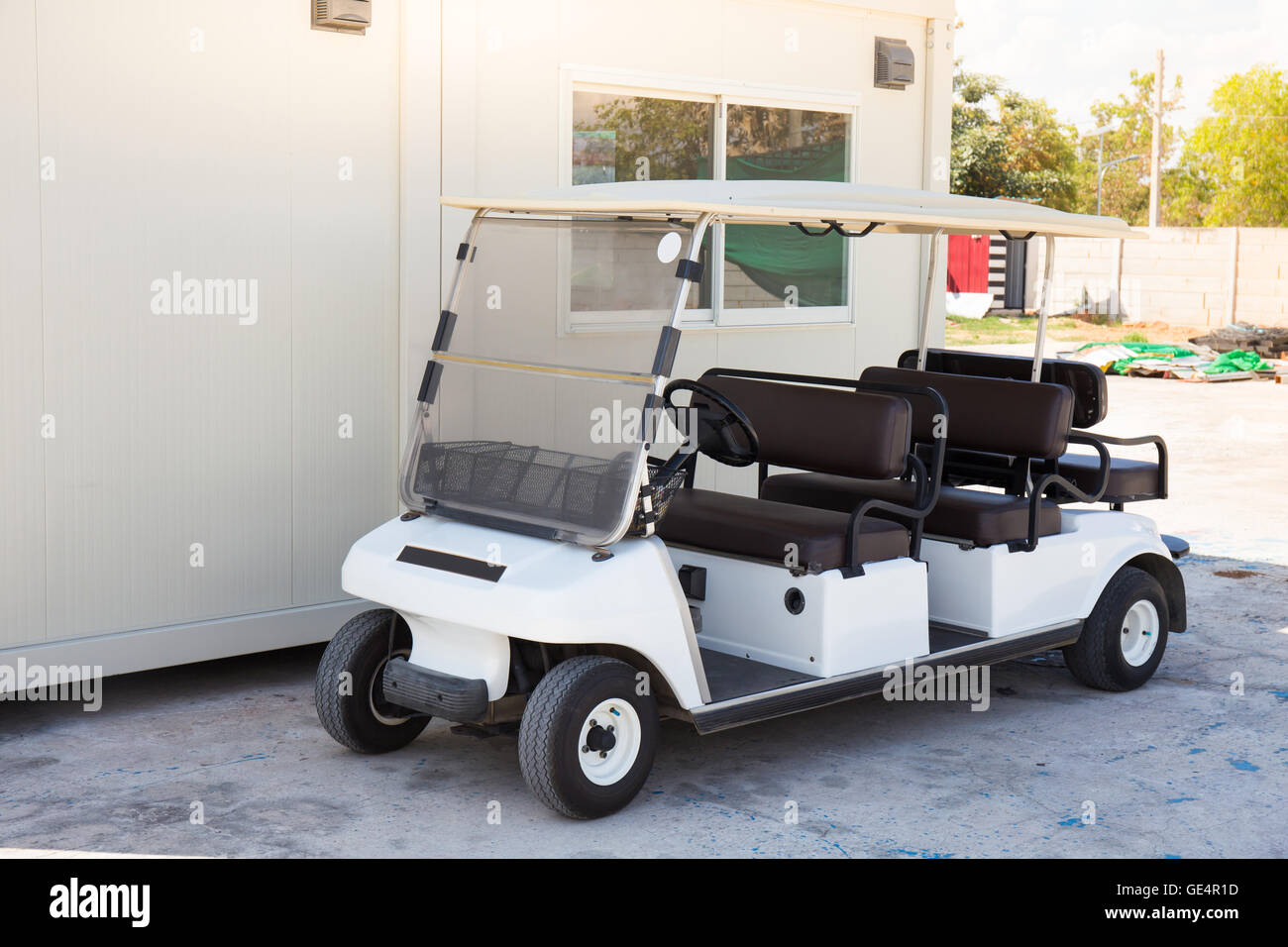 Golf car with backseat on location Stock Photo