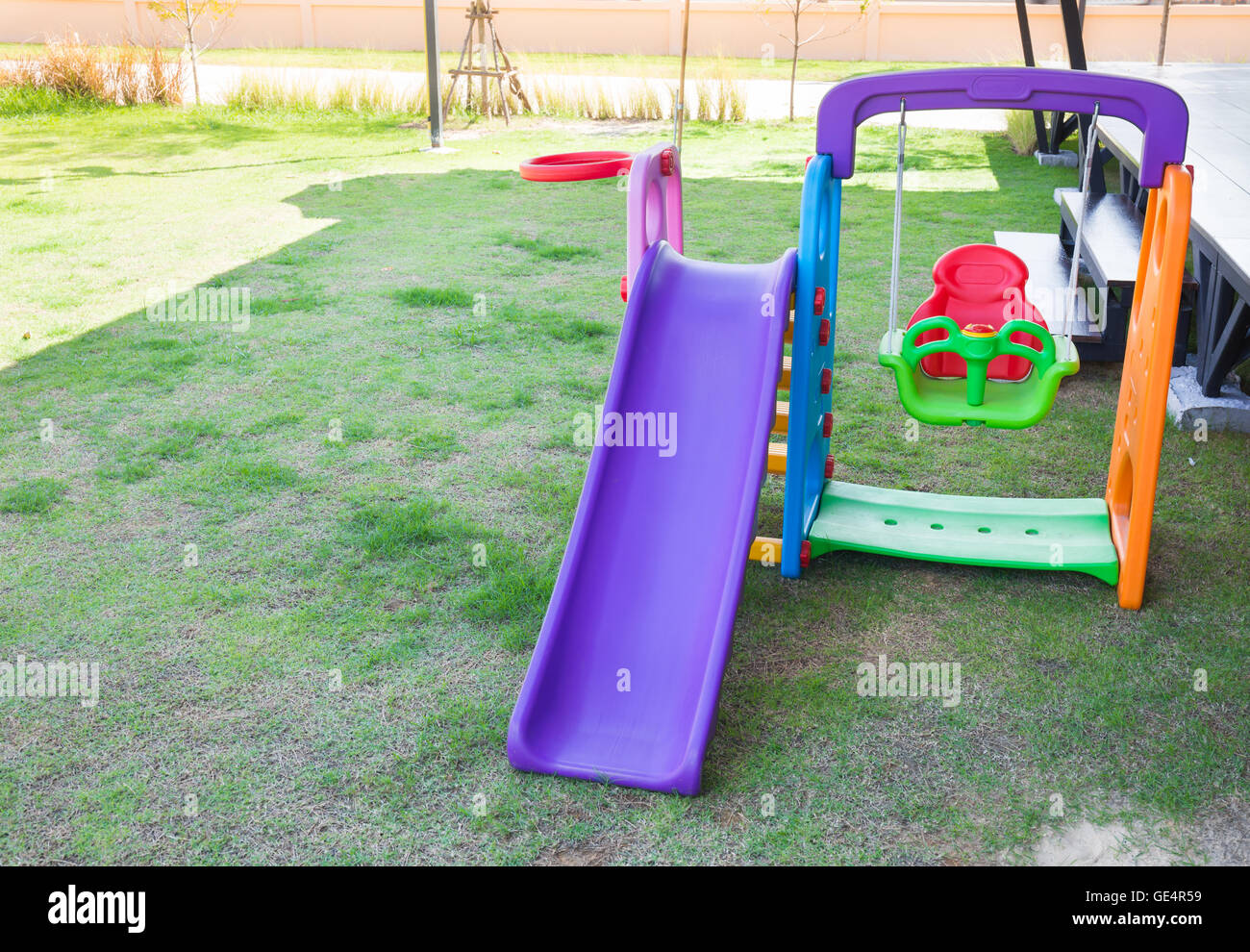 Children playground on lawn park Stock Photo