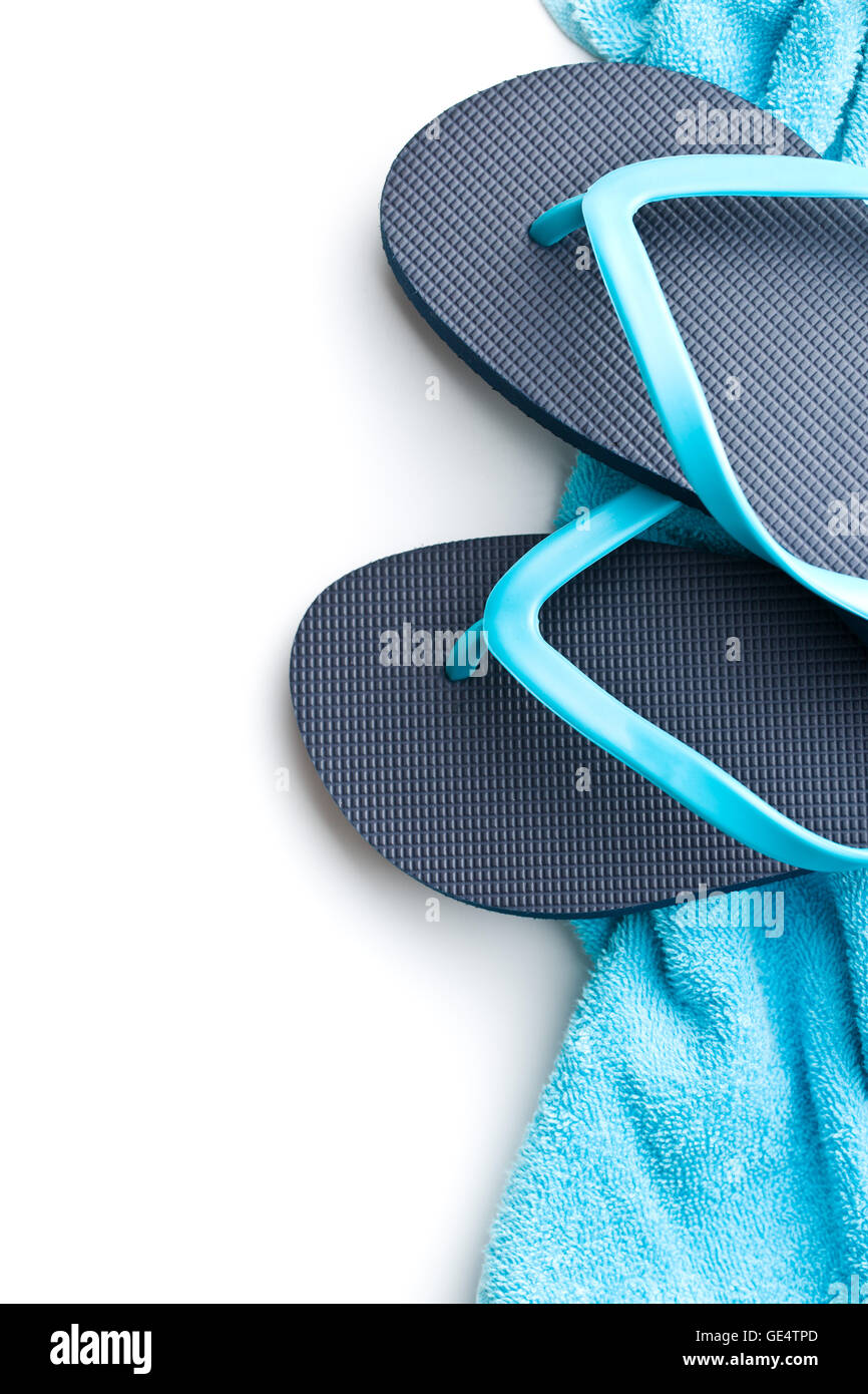 Flip flops and towel isolated on white background Stock Photo - Alamy