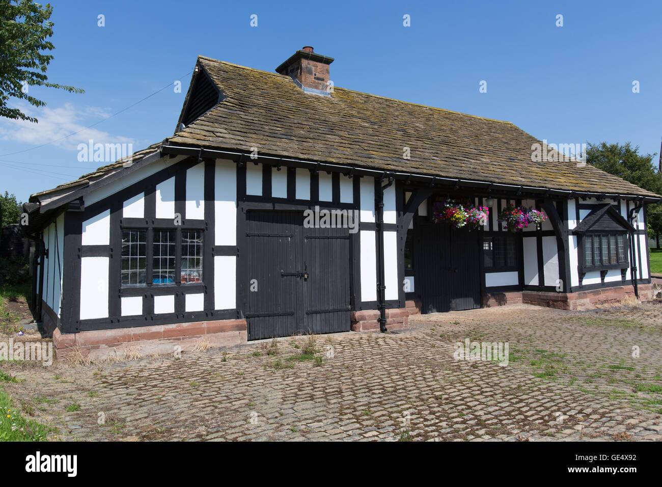 Picturesque view of the Grade II listed Smithy at the junction of Smithy Hill and Neston Road
