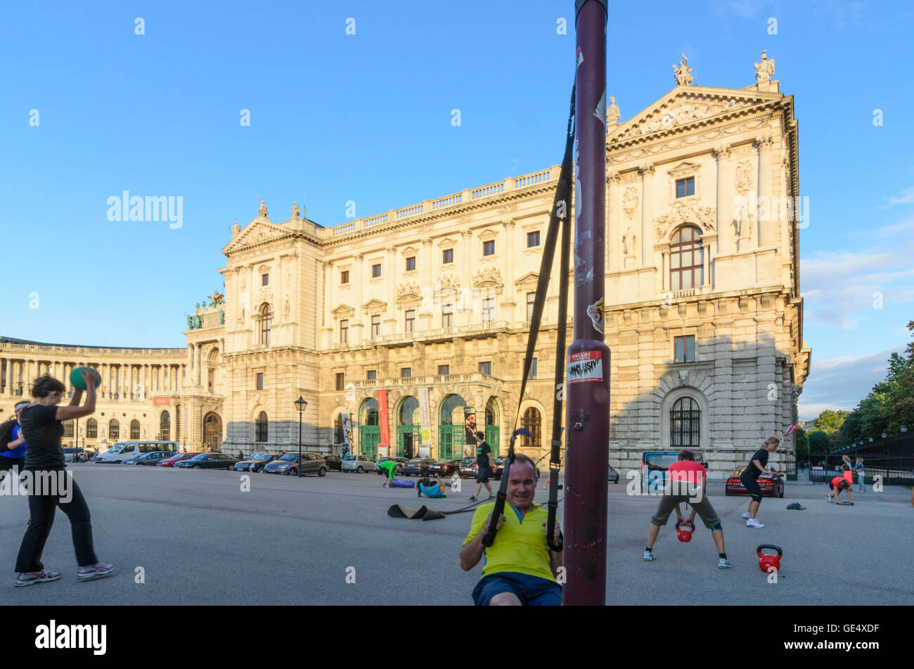 Wien, Vienna: Athletes a fitness boot camp before the Hofburg at last sunlight, Austria, Wien, 01. Stock Photo