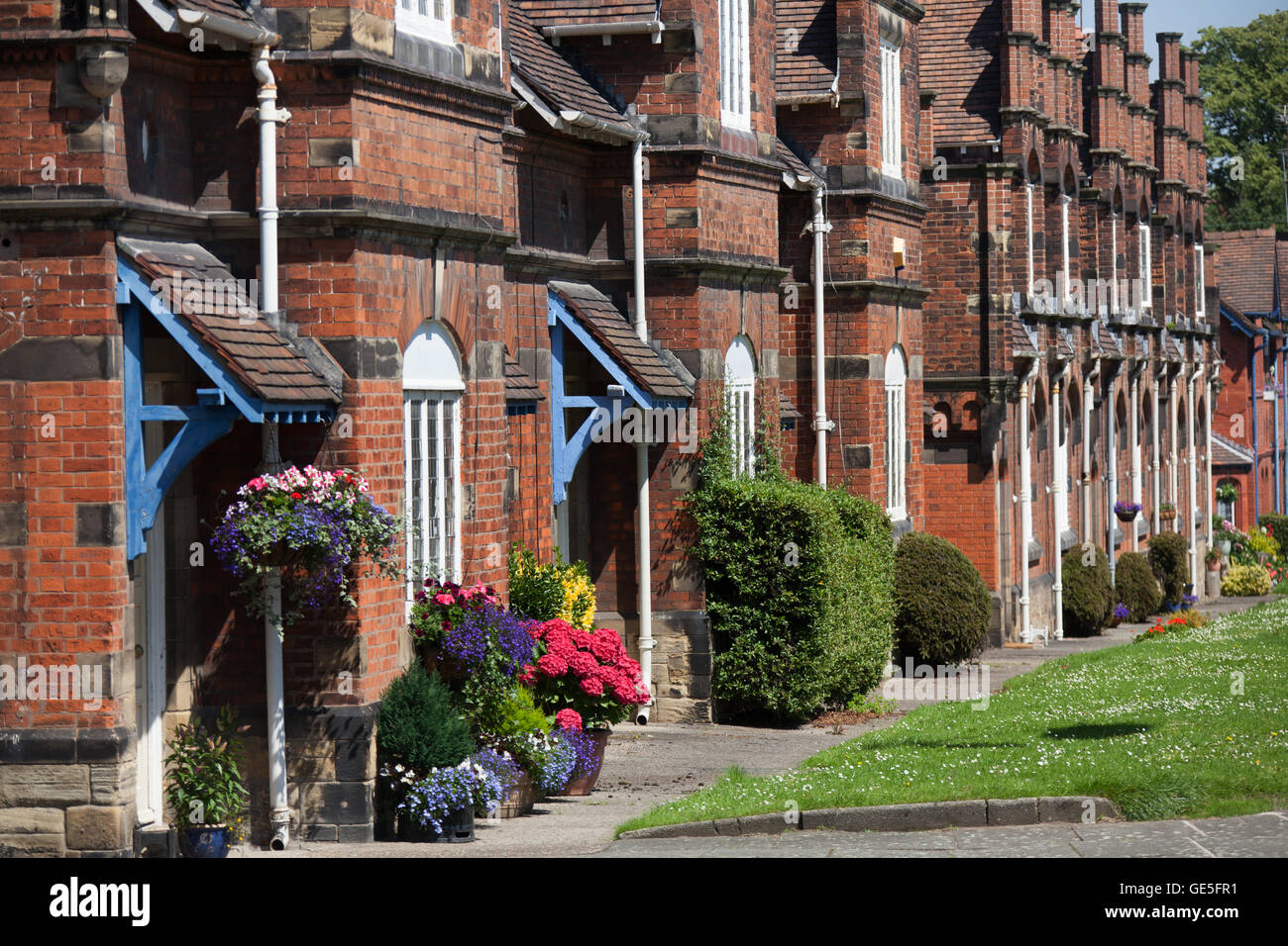 Village of Port Sunlight, England. Picturesque summer view of Port Sunlight cottages on Wood Street. Stock Photo