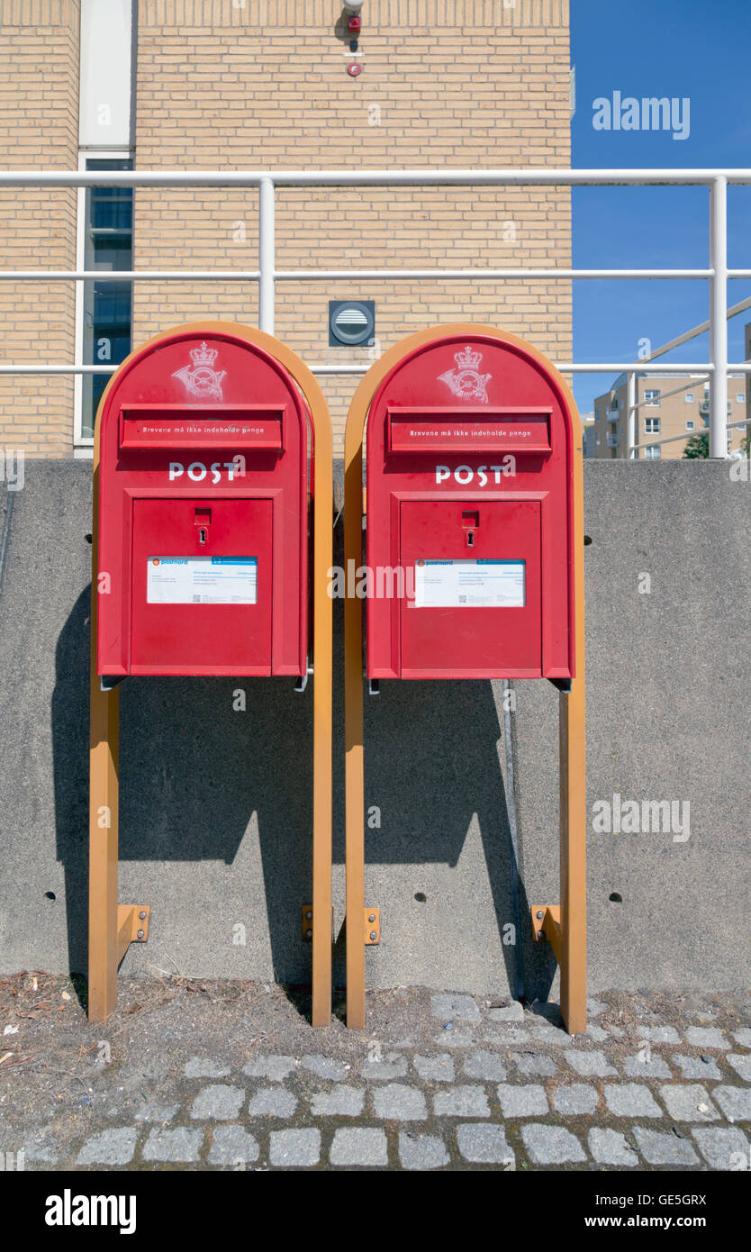 Two PostNord (earlier PostDanmark) post boxes in Copenhagen Stock Photo