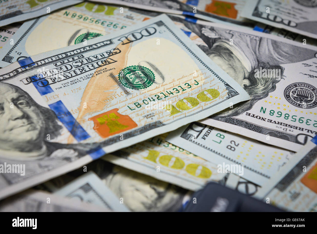 Background of one hundred dollar bills with vignette Stock Photo