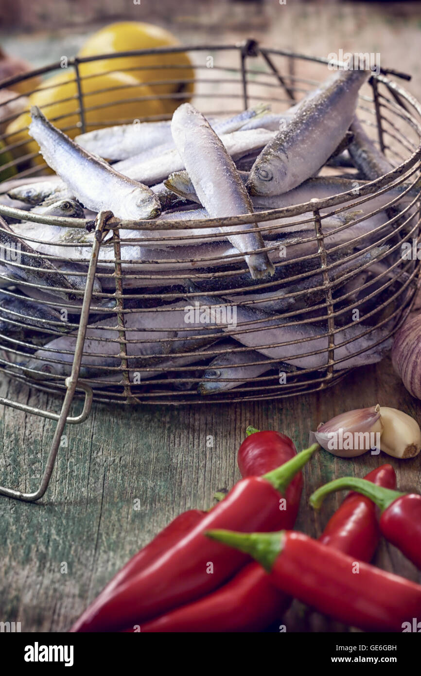 Fresh sardines with garlic, lemon and jalapeno peppers Stock Photo Alamy