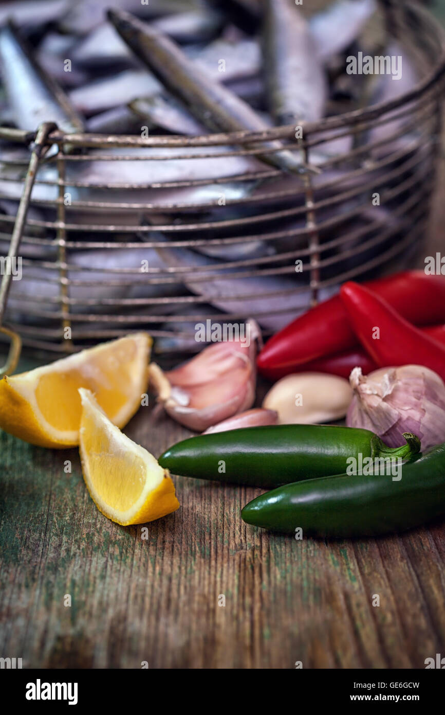 Fresh sardines with garlic, lemon and jalapeno peppers Stock Photo Alamy