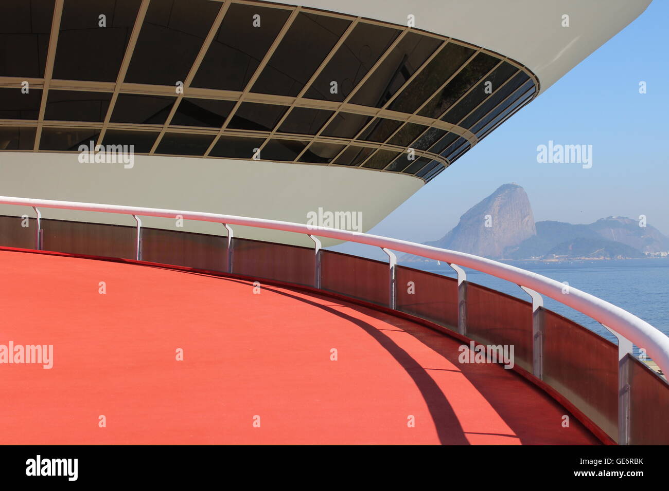 this photo shows the curves of the nature in background which was the inspiration for the curved architecture in the foreground Stock Photo