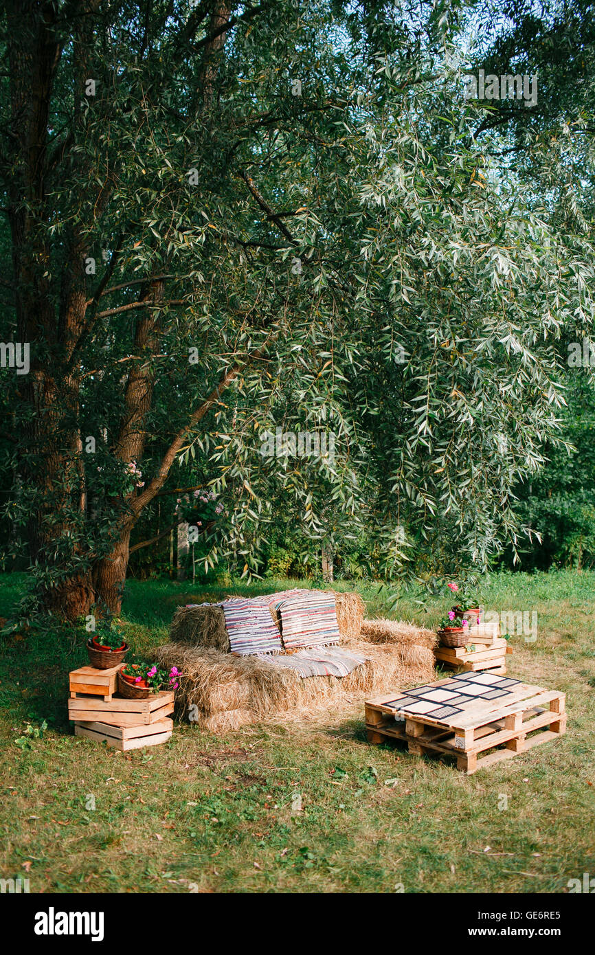 chair without backrest made from straw, outdoor furniture, cowboy party