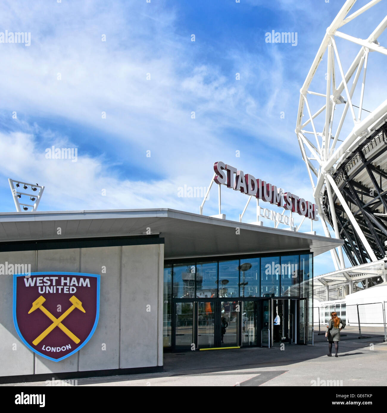 West Ham United logo on new London Stadium Store beside the converted 2012 Olympic Stadium in the Queen Elizabeth Olympic Park Newham Stratford UK Stock Photo
